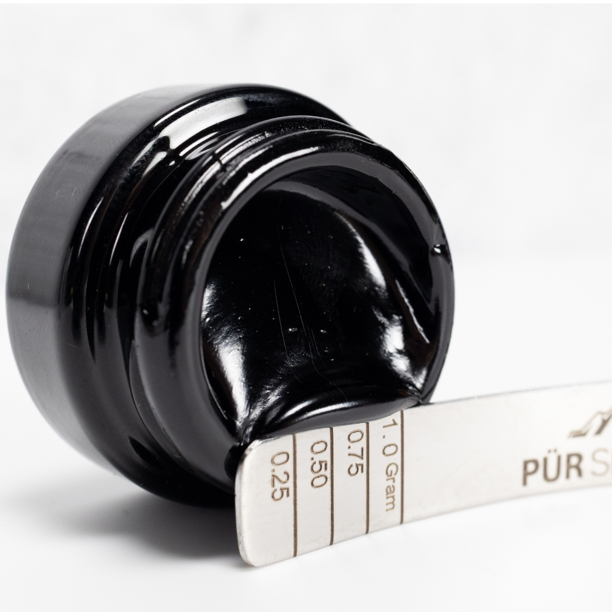 Pür Shilajit Tablets photographed at 14,000 feet in the Golden Mountains of Altai